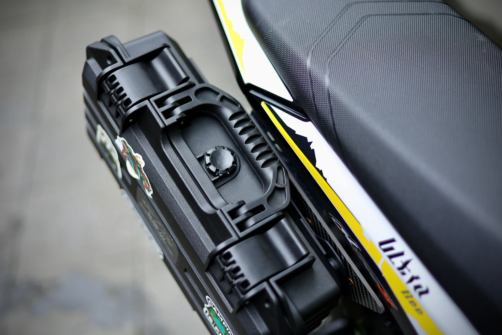 Overhead view of the side case beside the Ultra Bee seat