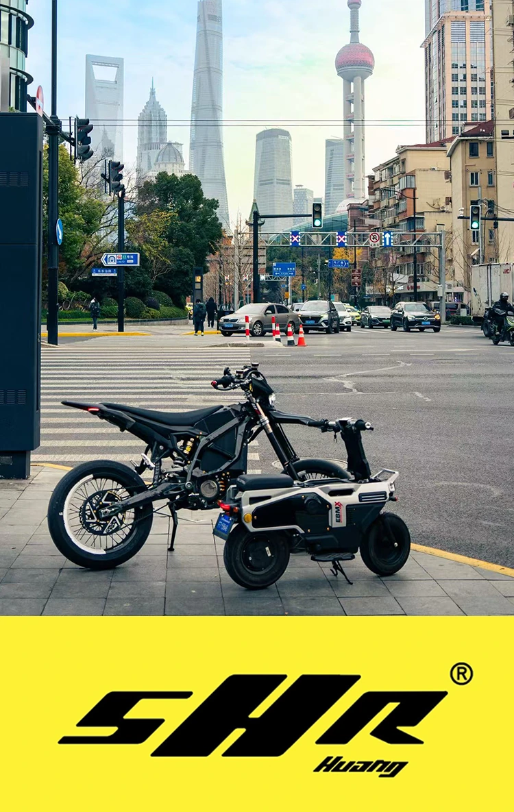 A Sur-Ron and a minibike parked together on a city street